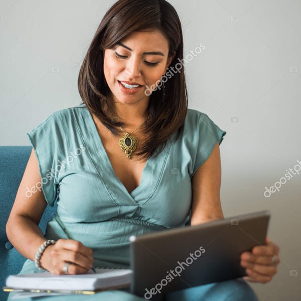 depositphotos_558456282-stock-photo-portrait-latina-woman-taking-notes